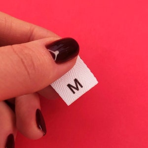 Twill sizing labels Fold and Sew-in SIZE Labels Clothing labels Silicone tags Custom care labels Garment labels
