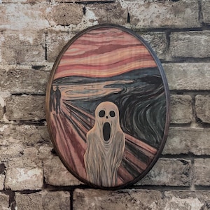 May include: A circular wooden wall art piece featuring a painting of Edvard Munch's "The Scream". The painting depicts a figure with a distorted face and a swirling background of red, orange, and blue.