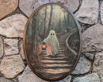 May include: A white ghost figure with two black eyes walks up a stone staircase in a dark forest. The ghost is holding a lantern with a glowing orange flame. The scene is painted on a round wooden plaque.