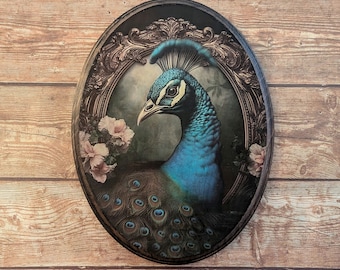 May include: A blue and green peacock with a gold ornate frame and pink flowers. The peacock is in a vintage style illustration.