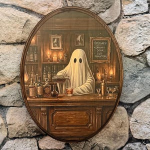 May include: Oval wooden sign featuring a ghost bartender pouring a drink in a dimly lit bar. The sign reads "Specials: -Spooky Sour, Old Phantom." The bar is stocked with bottles and lit by candles and lamps.