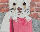Paper collage art, Ferret Shopoholic with a Raspberry Bag by Wendy Boucher, 6x6”, ready to hang or sit on a shelf
