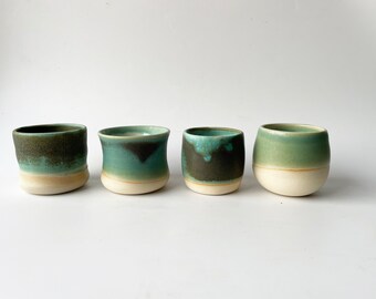 Assorted Pottery Cups and Tumblers  |  Set of Green Ceramic Cups, Each with a Singular Design