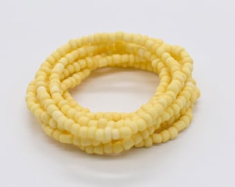 Braccialetto elastico con perline gialle, impilabile, taglia 7
