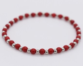 Set di braccialetti elastici con perline rosse, dettagli in argento, gioielli impilabili - Italia