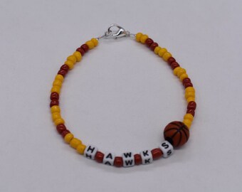 Pulsera de cuentas de los Atlanta Hawks, artículo para aficionados al baloncesto.