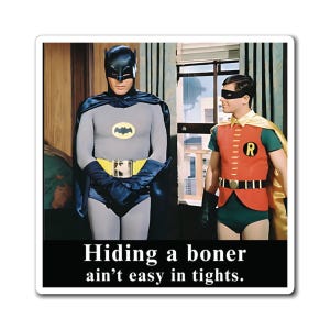 May include: A square sticker featuring a vintage image of Batman and Robin. Batman is in a gray suit with a black cape, and Robin is in a red and green outfit. The text at the bottom reads, "Hiding a boner ain't easy in tights."