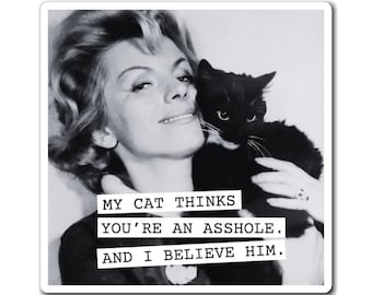 May include: A square sticker featuring a black and white photograph of a person holding a black cat. The text printed in white boxes reads: MY CAT THINKS YOU'RE AN ASSHOLE. AND I BELIEVE HIM. The sticker has a white border and a matte finish.