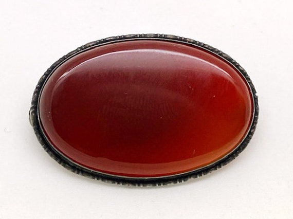 Lady’s vintage carnelian and silver brooch - image 1