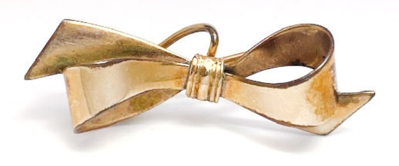 Lady’s vintage yellow gold bow brooch - image 1