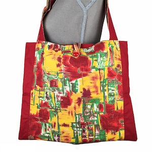 Wendbare, gefütterte Tragetasche für Damen aus Vintage-Stoff der 1950er Jahre mit abstraktem Grafikdruck auf der Rückseite aus Madras-Baumwolle in Gelb, Rot, Grün, Khaki und Weiß