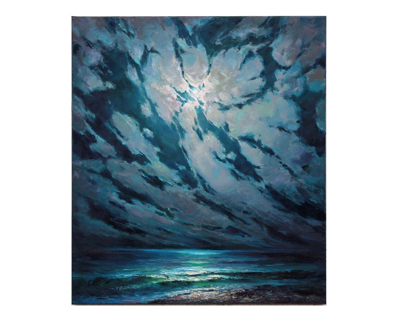 May include: A painting of a dark blue sky with white clouds and a bright moon shining through. The ocean is a dark blue with white waves and a sandy beach in the foreground.