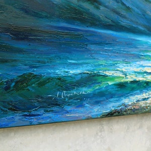 May include: A close-up of an abstract oil painting depicting a stormy seascape with deep blue and green hues. The artist's signature, "I.  Oripchenko", is visible in the lower right corner.