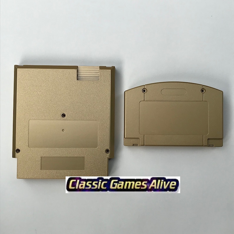May include: Two gold-colored video game cartridges. One is rectangular, the other is more rounded. The text "Classic Games Alive" is at the bottom of the image.