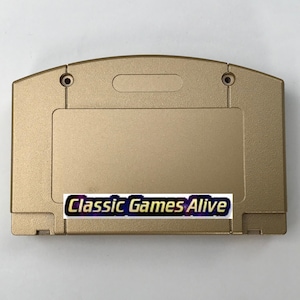 May include: A gold-colored video game cartridge with the text "Classic Games Alive" on a sticker. The cartridge has a rectangular label area and two screw holes near the top.