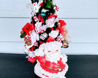 Mid-century ceramic Napcoware 8 inch Santa planter with spaghetti trim; one of a kind hand decorated bottle brush tree kitsch accent piece