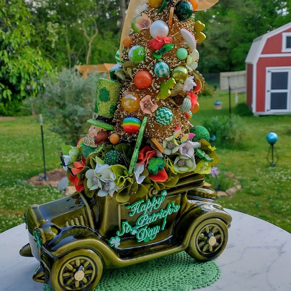 Saint Patrick's Day theme centerpiece; Leprechaun / shamrock kitsch bottle brush tree; Mid-century McCoy jalopy planter