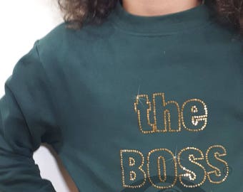 the Boss (gold rhinestones on green) sweater