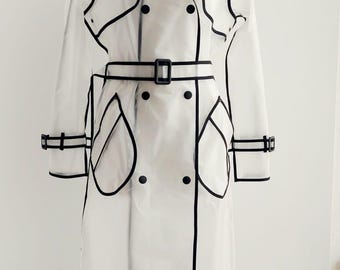 Classic Translucent Matt RainCoat with Black trim and removable hood. Women's designers trenchcoat. PVC woman's coat.