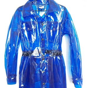 A transparent blue unisex overall Domdrich with a button-up front, long sleeves, and a black elastic waistband.
