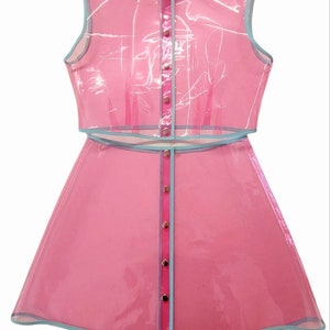 Bright ladies set: cropped top and the skirt. Transparent unique clothes. Party clothing.