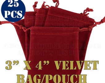 May include: A set of 25 red velvet drawstring bags, each measuring 3 inches by 4 inches. The bags are made of soft, luxurious velvet and are perfect for storing small items like jewelry, gifts, or favors.