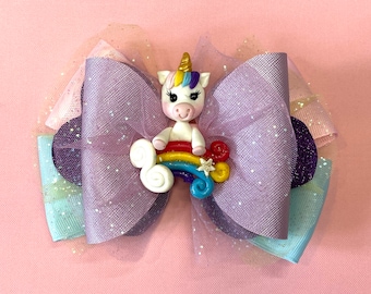Girls Hair Bow with Clay Doll and ribbons, Design: Unicorn loving her rainbow, multi layered hair accessory, great for birthday