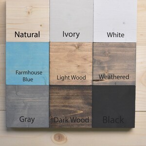 May include: Nine wood samples painted in different colors, including natural, ivory, white, farmhouse blue, light wood, weathered, gray, dark wood, and black.