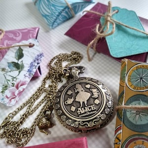 NEW - Alice in Wonderland pocket watch on necklace with charm - full size working pocketwatch