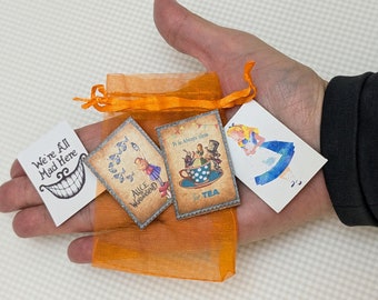 Pack of miniature Alice in Wonderland fridge magnets, assorted designs in gift bag
