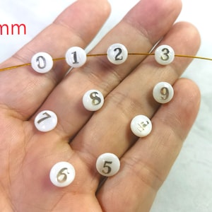 Cuentas de nácar de 8 mm con números arábigos dorados, cuentas de dígitos de concha blanca, cuentas de números de doble cara, agujero de 0,8 mm, opciones de cantidad, BA-1438