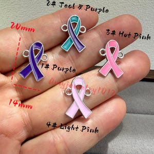 May include: Four metal awareness ribbon charms with enamel fill, featuring 1# Purple, 2# Teal & Purple, 3# Hot Pink, and 4# Light Pink colors. Each charm has two side loops and measures 20mm in height by 14mm in width as indicated by the text.
