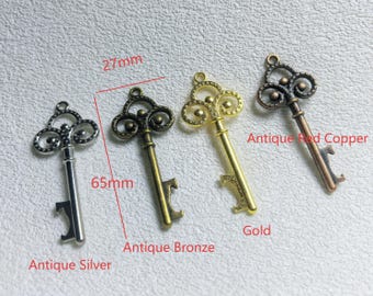 Flesopenersleutelhangers, 27 x 65 mm sleutelhanger, dubbelzijdige sleutel voor het maken van sieraden, vier kleuren beschikbaar, veel 10/20 stuks. BA-1854