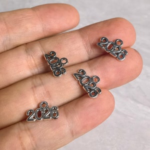 Antiqued Silver Year 2026 Charms , 2026 Graduation , Silver Year 2026 Charm, New Year Charm ,Graduation Charm ,14x9mm ,50pcs / 100pcs