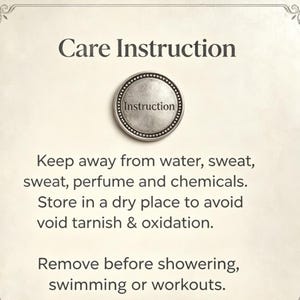 May include: A square card with a decorative border featuring the text Care Instruction at the top, a circular silver-toned emblem with the word Instruction in the center, and printed text advising to keep away from water, sweat, perfume, and chemicals.