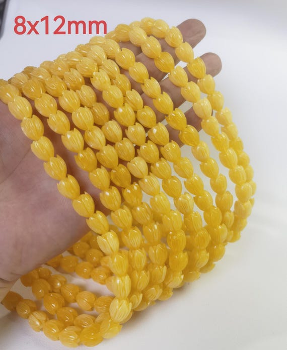 ハワイアンピカケビーズ、8 x 10 mm 10 x 12 mm イエローフラワー