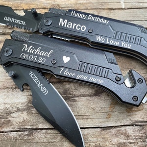 May include: Two black multi-tools with blades and various built-in tools. One is engraved with "Happy Birthday Marco" and "We Love You." The other reads "Michael 08.05.20" and "I love you more."