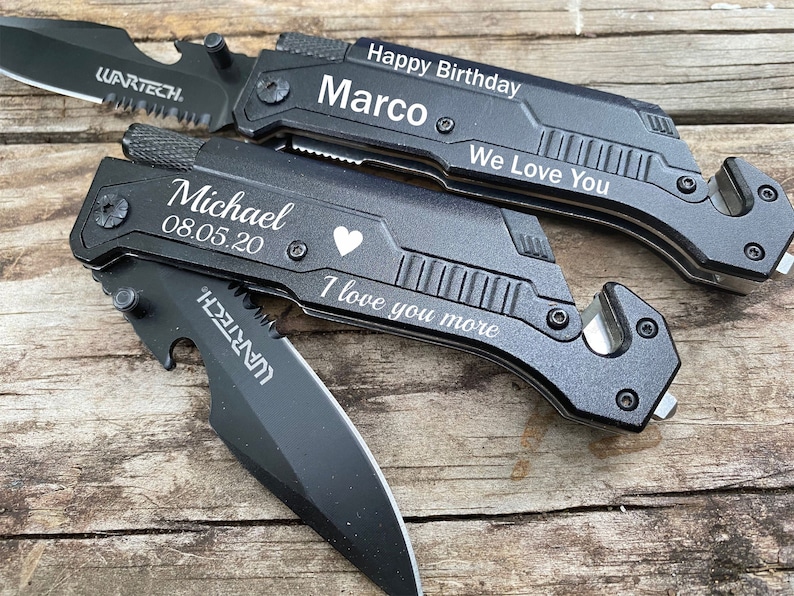 May include: Two black multi-tools with blades and various built-in tools. One is engraved with "Happy Birthday Marco" and "We Love You." The other reads "Michael 08.05.20" and "I love you more."