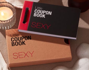 May include: Two small coupon books, one black and one tan, are displayed. The black book has a red spine and the words "Little COUPON BOOK" and "SEXY" printed in white and red. The tan book has the same text in the same colors.