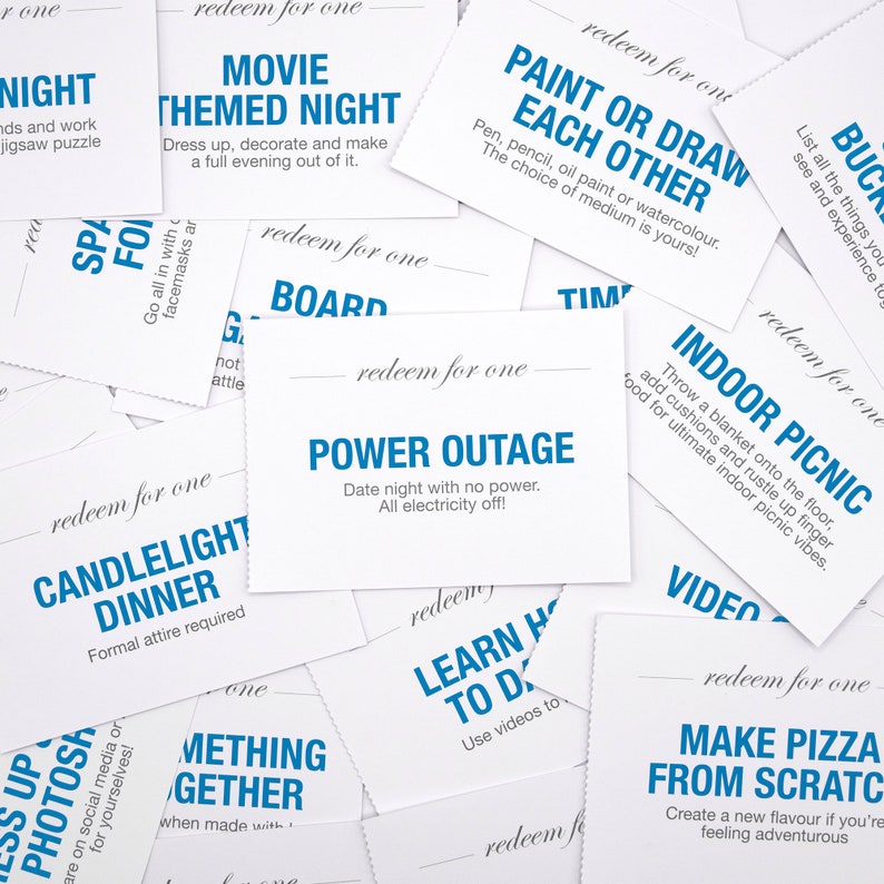 May include: A collection of white cards with blue text, each card has a different date night idea. Some of the ideas include "Movie Themed Night", "Candlelight Dinner", "Paint or Draw Each Other", "Indoor Picnic", and "Power Outage".