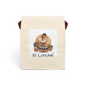 May include: Cream-colored lunch bag with brown handles. The bag features a square graphic of a woman cooking over a fire, with the text "El Lonche!" below the image. The illustration has warm tones of orange, brown, and beige.