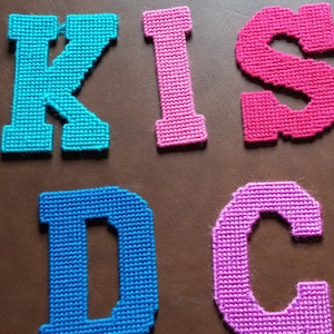 Letters in plastic canvas