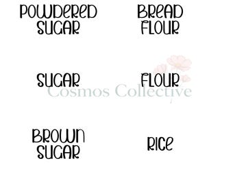 May include: A set of black vinyl labels featuring the text Powdered Sugar, Bread Flour, Sugar, Flour, Brown Sugar, and Rice in a rounded font. The text Cosmos Collective is visible in the center with a faint pink floral graphic behind it.