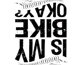 May include: A black graphic design on a white background featuring the text IS MY BIKE OKAY? in a distressed, bold, sans-serif font. The text is oriented vertically and mirrored, with decorative dotted lines above and below the lettering.