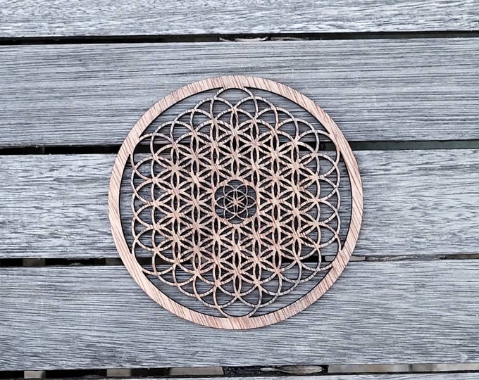 Wooden coasters pattern flower of life. Sacred geometry, relaxation tea. Artisanal laser cutting.