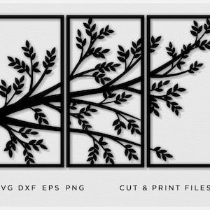 May include: A triptych wall art piece with a black tree branch design and leaves set against a white backdrop. The artwork is framed in black. Text at the bottom reads "SVG DXF EPS PNG" and "CUT & PRINT FILES".