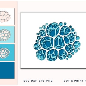 May include: A layered paper art design featuring a cluster of interconnected, organic shapes in shades of blue. The design is displayed on a white background, with additional color variations and a solid blue swatch. Text at the bottom reads "SVG DXF EPS PNG CUT & PRINT FILES."