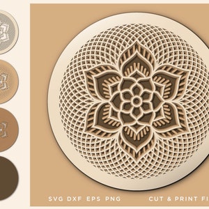 May include: A layered, circular design featuring a floral mandala pattern. The design is in shades of brown and beige, with intricate cut-out details. The image includes a larger mandala and several smaller versions.