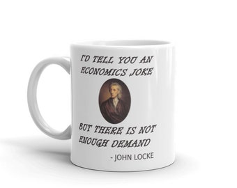 May include: White ceramic mug with a black rim and handle. The mug features a black and white illustration of John Locke, a quote about economics, and the text "I'd tell you an economics joke, but there is not enough demand - John Locke".