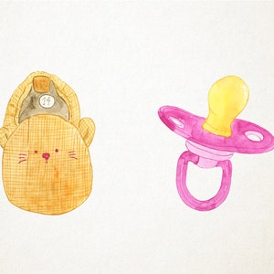 May include: A yellow and brown plush toy shaped like a bear with a number "14" on its head, and a pink and yellow baby pacifier.